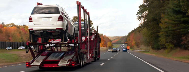 Open carrier for vehicles on a highway.